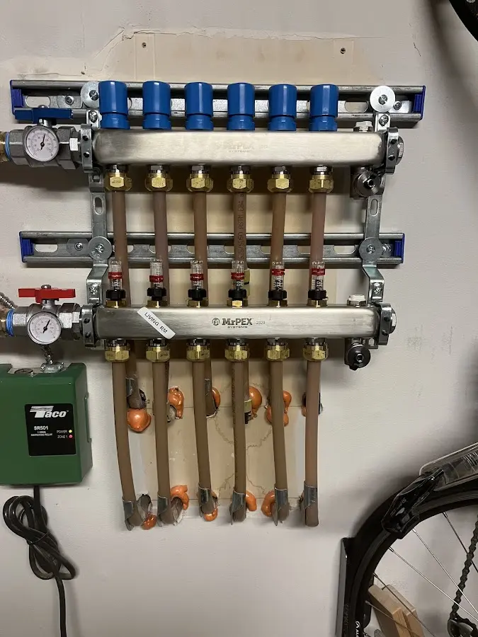 Plumber performing Water Heater Repair at a residential property in Palmyra